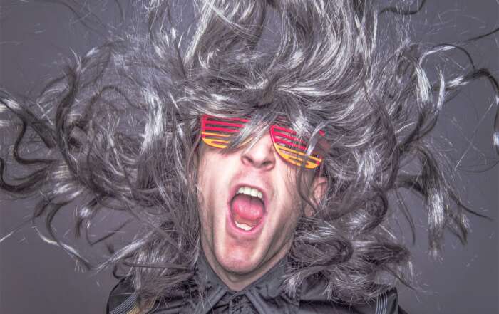 How to Attract Women with the Right Hairstyle and Haircut big hair musician
