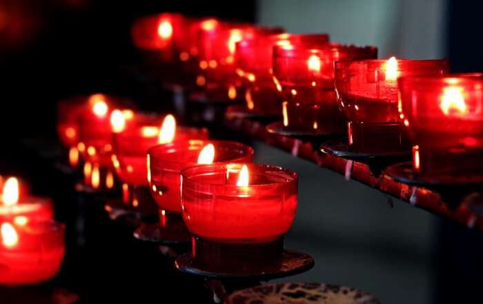 She's Dating a Guy Who is Changing His Religion red christian candles church