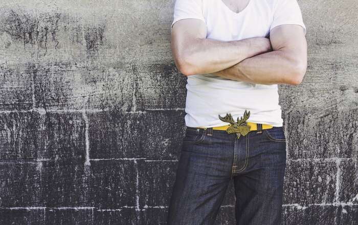 Her Best Friend is Flirting With Her New Boyfriend man arms crossed belt buckle