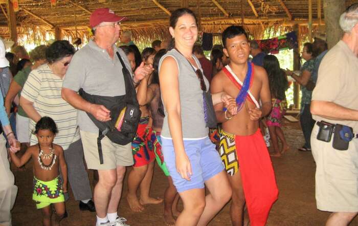 Experiencing the Joyous Embera Dance in Panama A picture containing person, people, group, crowd Description automatically generated